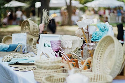 Boho items for sale on a table at an outdoor market